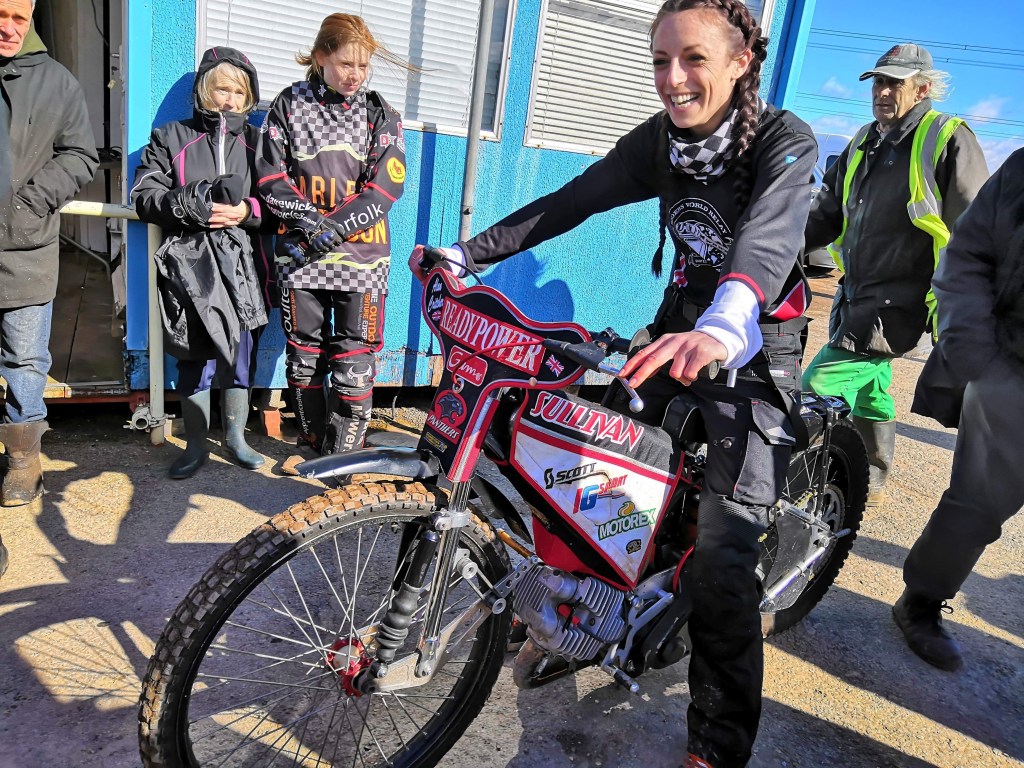 Hayley Bell WRWR founder on a dirt bike
