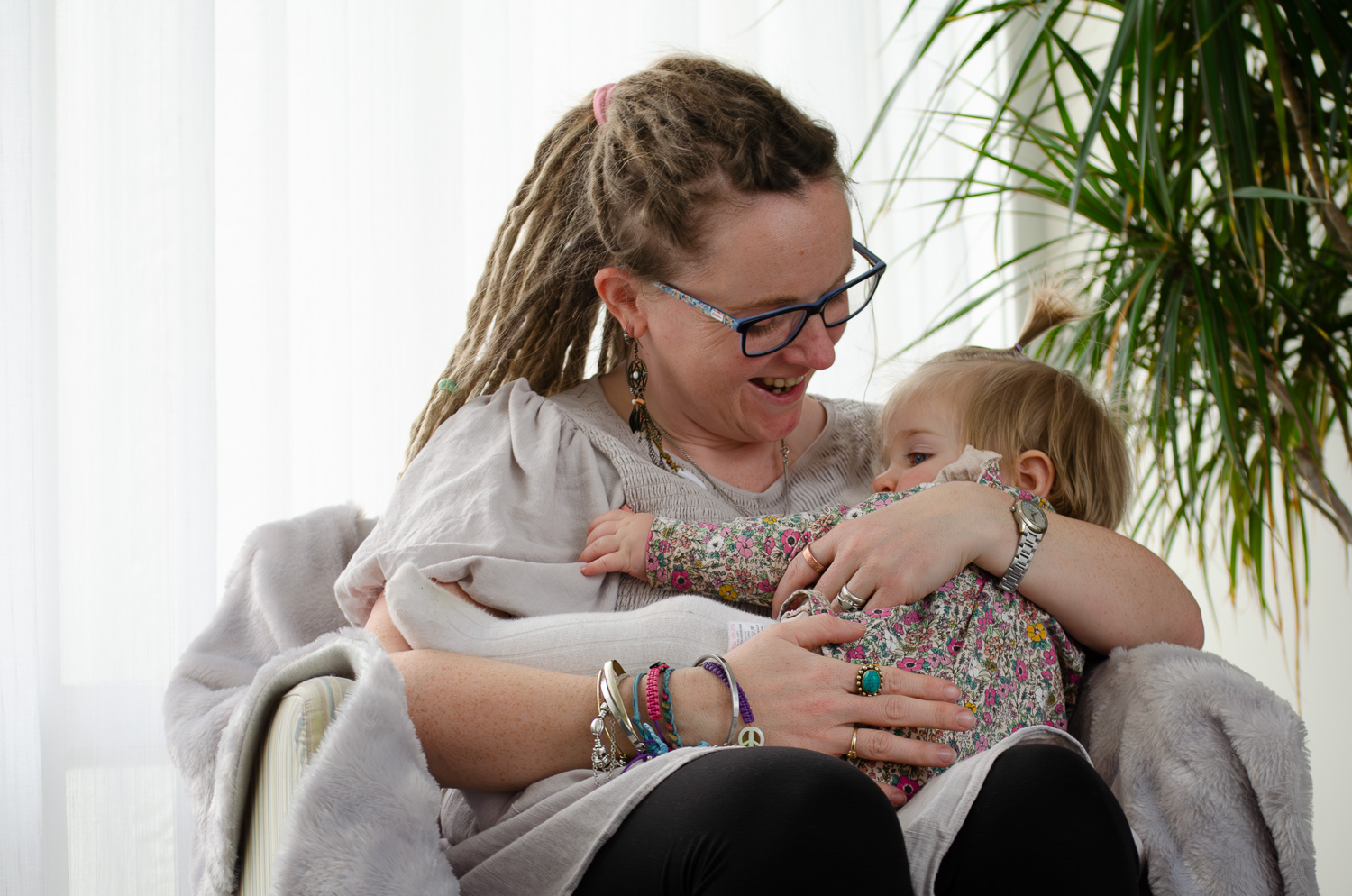 A photograph of a mother and her baby daughter