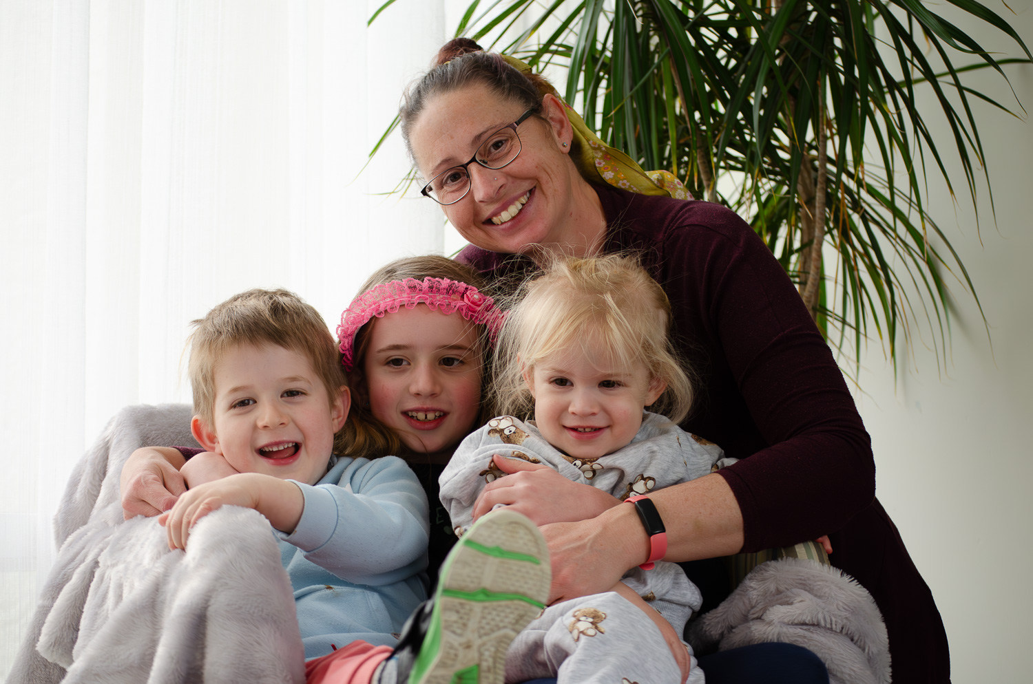 A family portrait photo of a mum and her kids. Taken by Te Awamutu, Waikato based, award winning, family photographer, Donna from Donna May Photography.