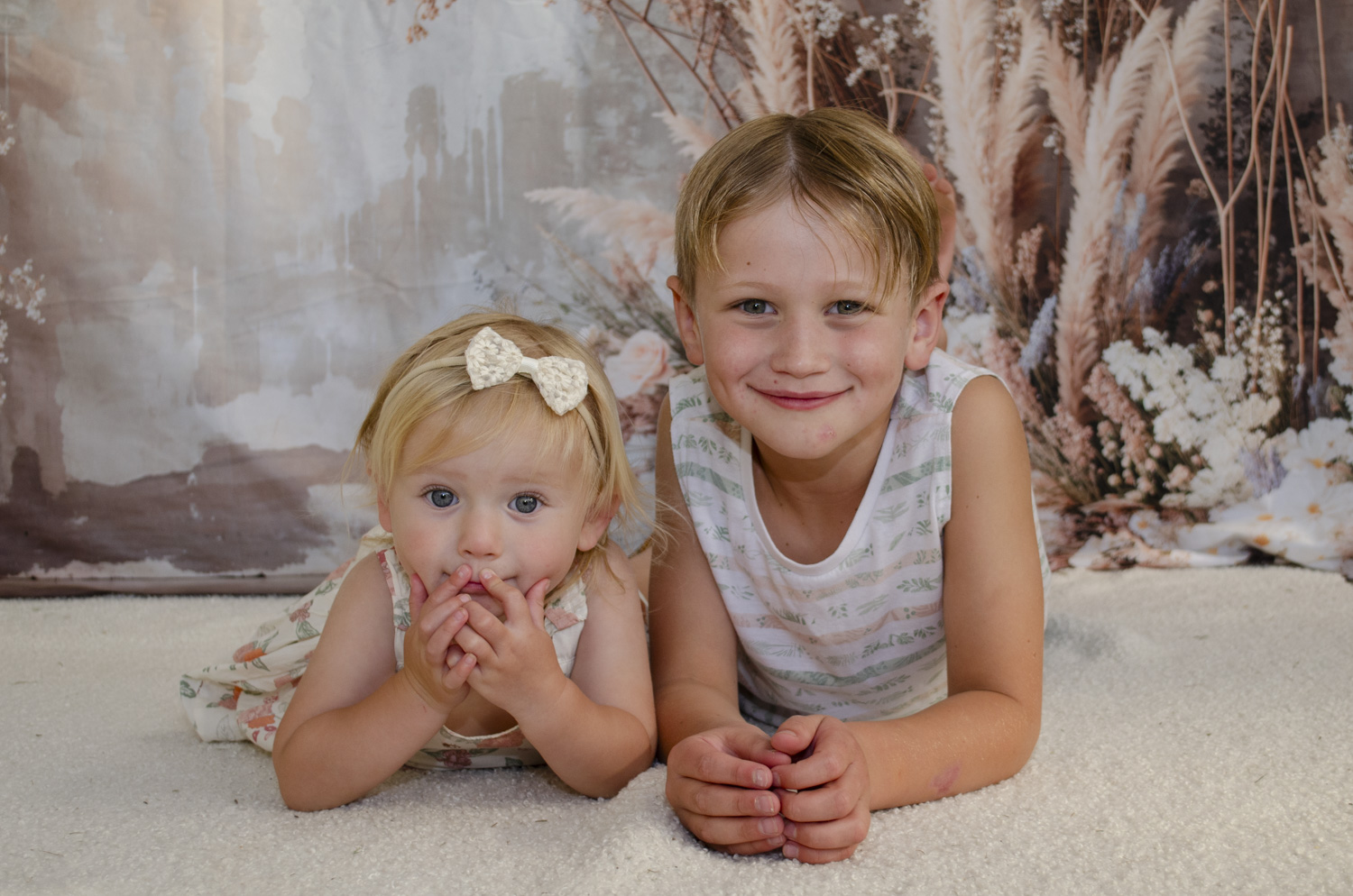 Children's family portrait photo of two young siblings. Taken by Te Awamutu, Waikato based photographer, Donna from Donna May Photography.