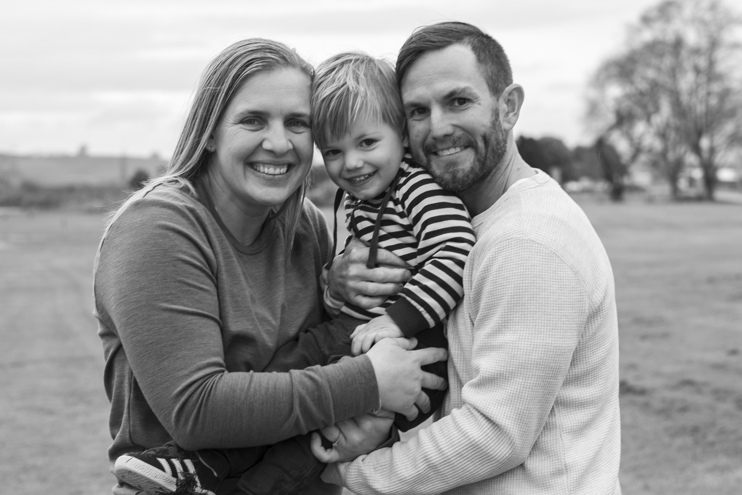 A black and white lifestyle, family photo. Taken by Te Awamutu, Waikato based, photographer, Donna from Donna May photography.